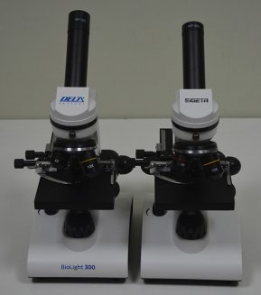 Микроскопы SIGETA Bionic 64x-640x и Delta Optical Biolight 300 рядом на столе: сравниваем размеры